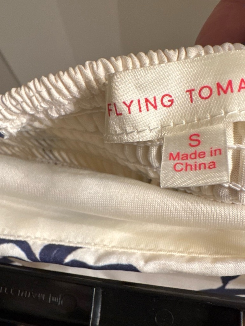 Flying Tomato Cream Top with Navy Floral Accents